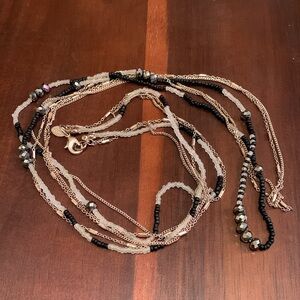 Express rose gold tone three strand necklace